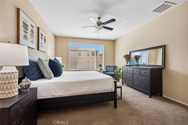 carpeted bedroom featuring ceiling fan