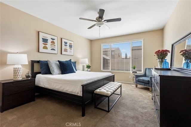 bedroom featuring ceiling fan and light colored carpet