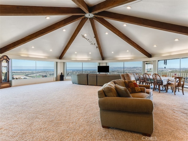 living room with vaulted ceiling with beams and carpet