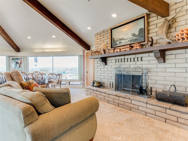 carpeted living room with beamed ceiling and a fireplace