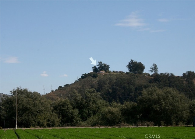 view of mountain feature with a rural view