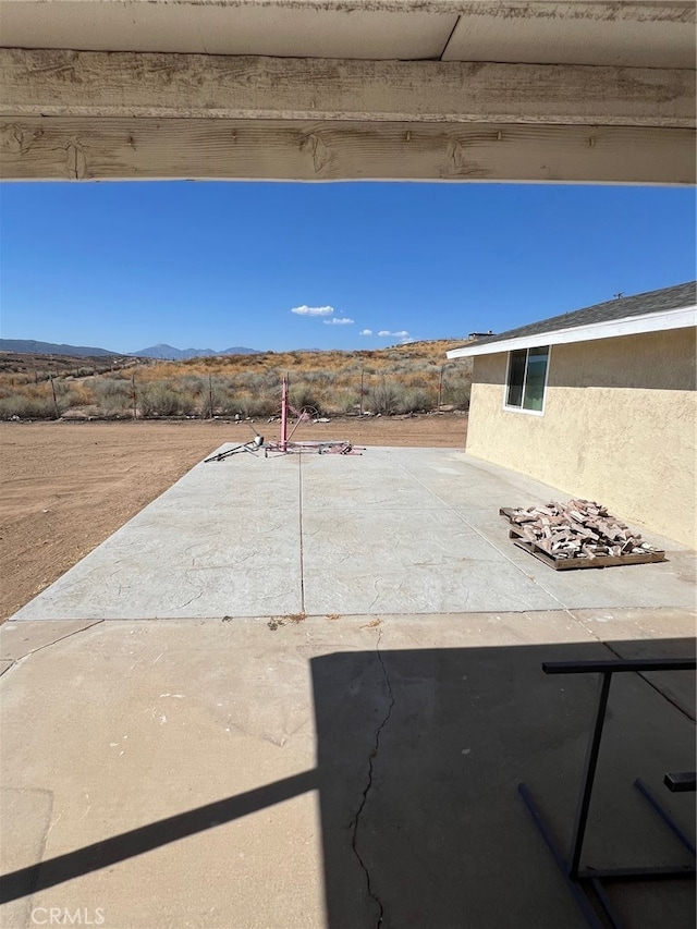 view of patio featuring a mountain view