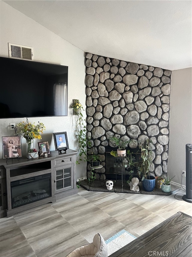 living room with lofted ceiling