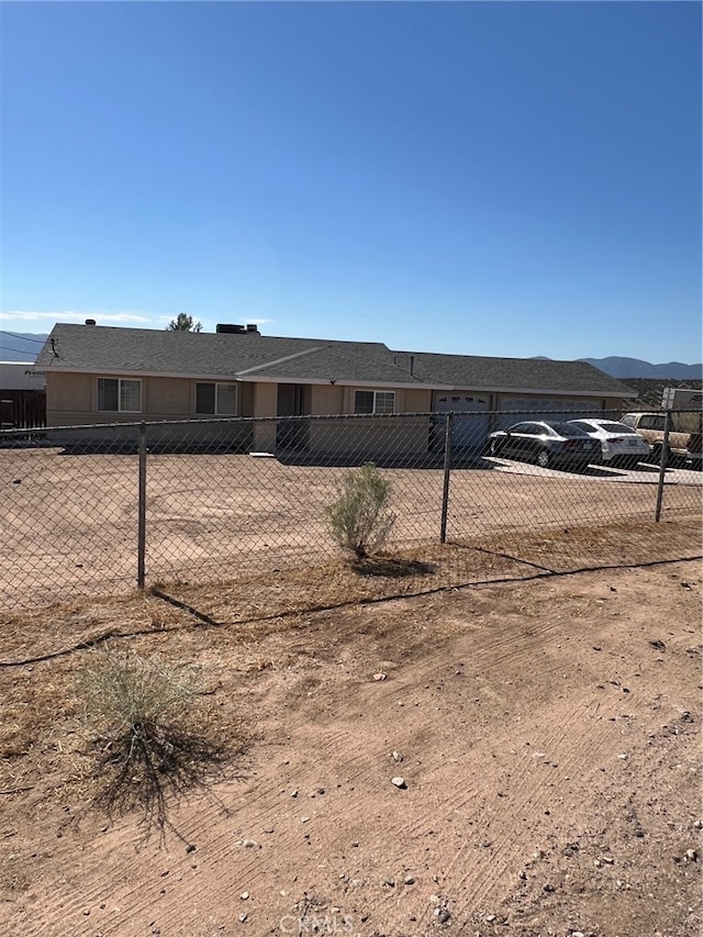 view of front of house with a mountain view