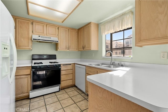 kitchen featuring kitchen peninsula, white appliances, sink, light brown cabinets, and light tile patterned flooring