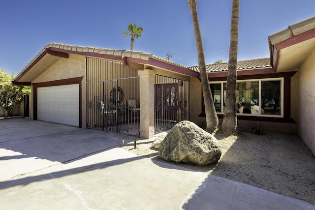 view of front of property with a garage