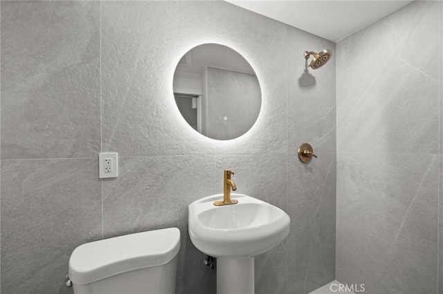 bathroom with toilet and sink