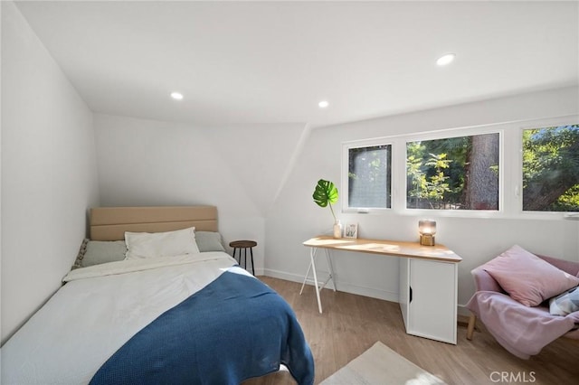 bedroom featuring light wood-type flooring