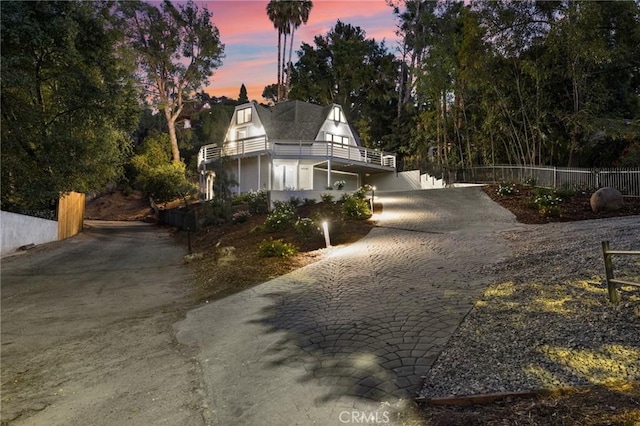 view of property exterior at dusk