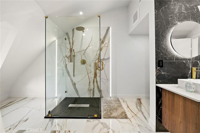 bathroom featuring tile walls, a shower with door, and vanity