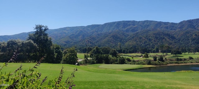 view of mountain feature featuring a water view