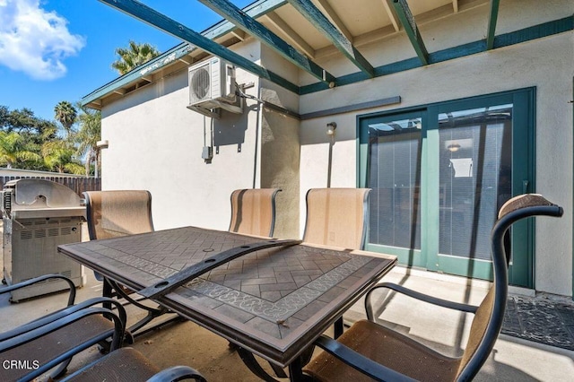 view of patio featuring ac unit and grilling area