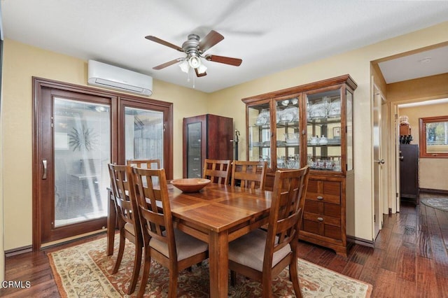 dining room featuring an AC wall unit, dark hardwood / wood-style floors, and ceiling fan