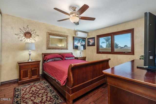 bedroom with ceiling fan, a wall mounted AC, and dark hardwood / wood-style floors