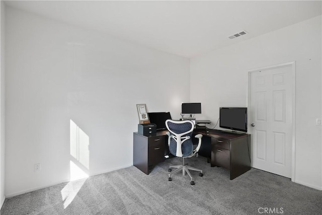 office area featuring light colored carpet