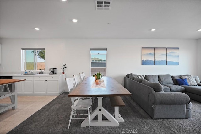 dining space featuring sink