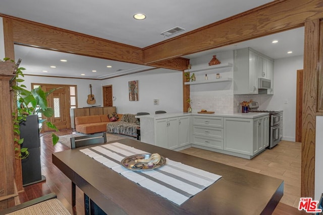 dining space with light wood-type flooring