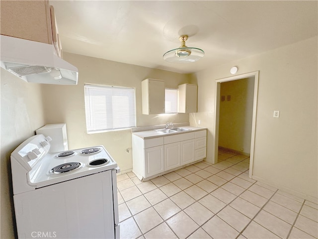 kitchen featuring light tile patterned floors, sink, white cabinetry, exhaust hood, and white range with electric stovetop