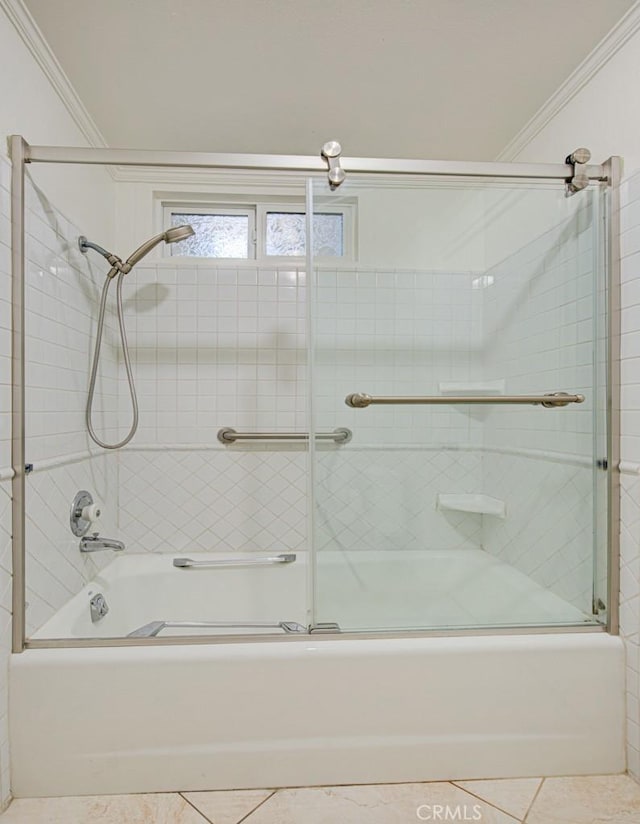 bathroom with crown molding, tile patterned floors, and enclosed tub / shower combo