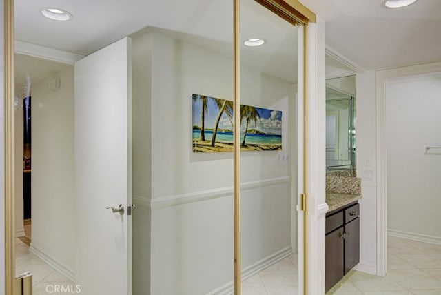 bathroom with vanity and tile patterned flooring