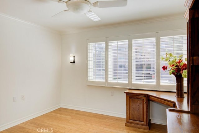 unfurnished dining area with ceiling fan, light hardwood / wood-style floors, and crown molding