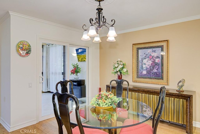 dining area with crown molding, a notable chandelier, and light wood-type flooring