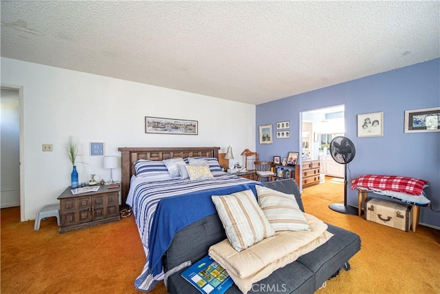 carpeted bedroom with a textured ceiling