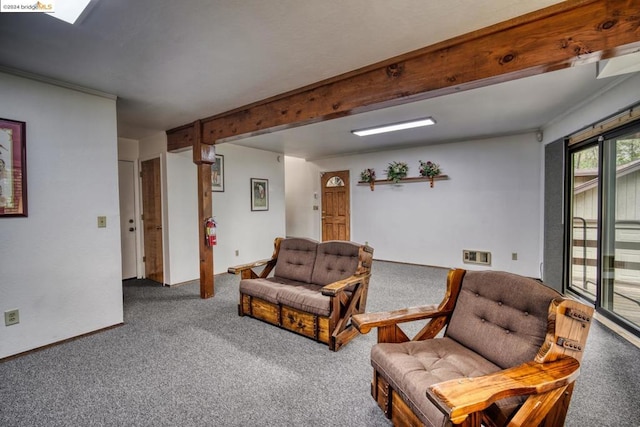 living room featuring beam ceiling and carpet floors