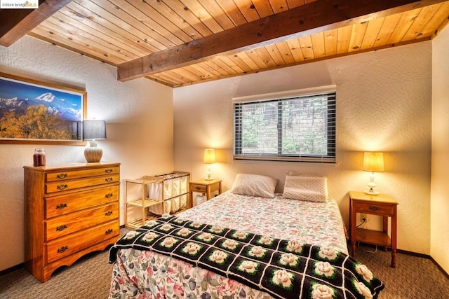 carpeted bedroom with beamed ceiling and wooden ceiling