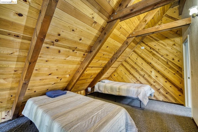 bedroom with wooden walls, wood ceiling, and lofted ceiling with beams