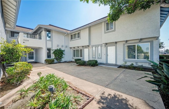 rear view of property with a patio