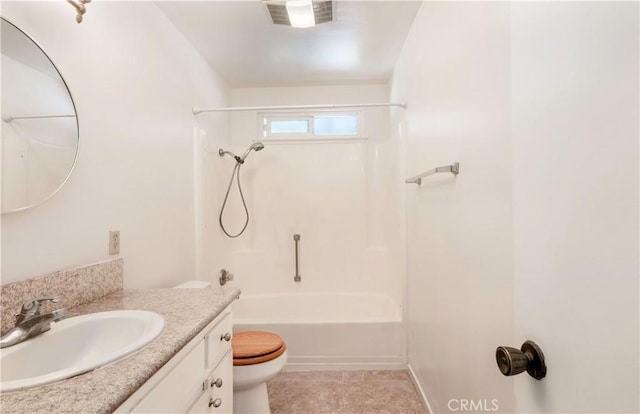 full bathroom featuring bathtub / shower combination, vanity, and toilet