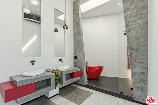 bathroom featuring vanity and a shower