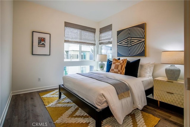 bedroom featuring dark hardwood / wood-style floors