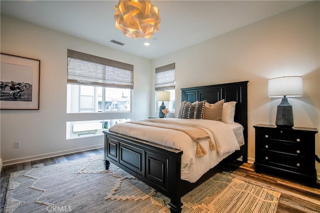 bedroom featuring wood-type flooring