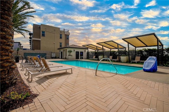 view of swimming pool featuring a patio area