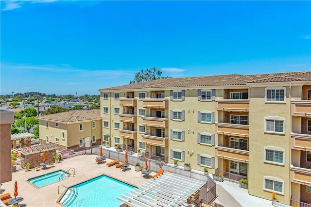 view of swimming pool featuring a patio area