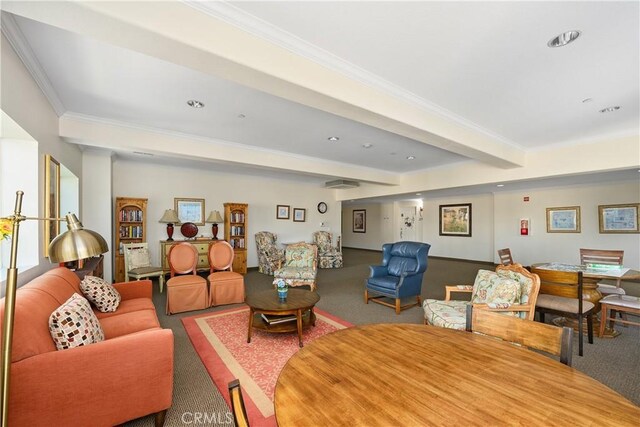 living room featuring carpet, beamed ceiling, and crown molding