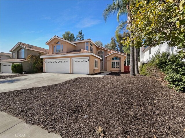 view of front of home with a garage