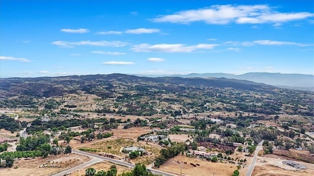 drone / aerial view featuring a mountain view