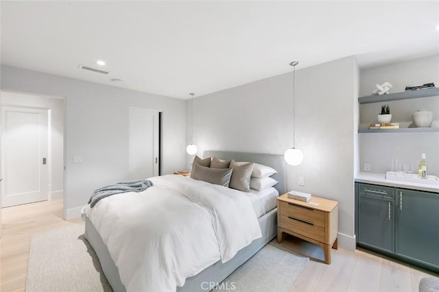 bedroom featuring light hardwood / wood-style flooring