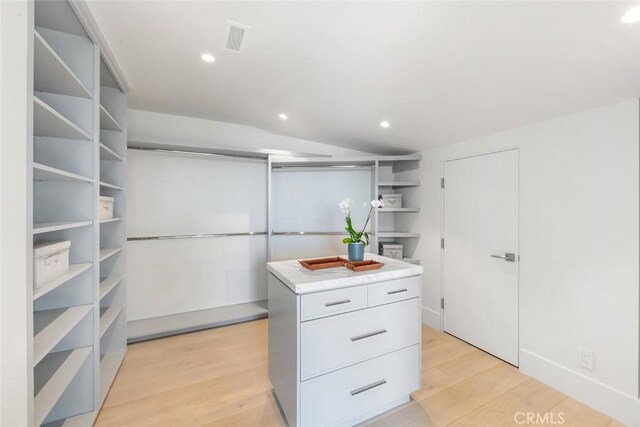 walk in closet featuring light wood-type flooring