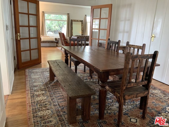 dining area with light hardwood / wood-style flooring