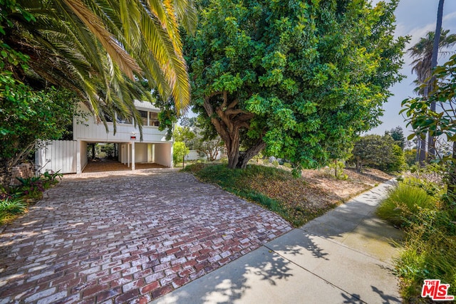 view of front of home featuring a carport