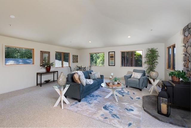 living room featuring light carpet