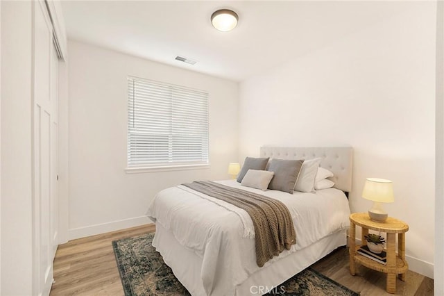 bedroom featuring light hardwood / wood-style flooring