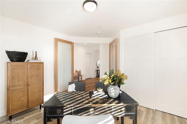 home office with light wood-type flooring