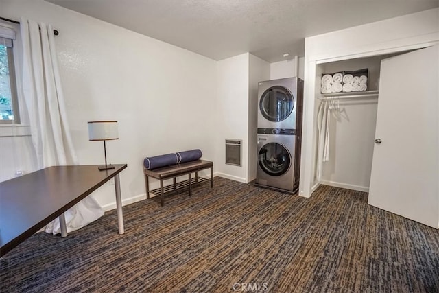 laundry room featuring stacked washer and clothes dryer