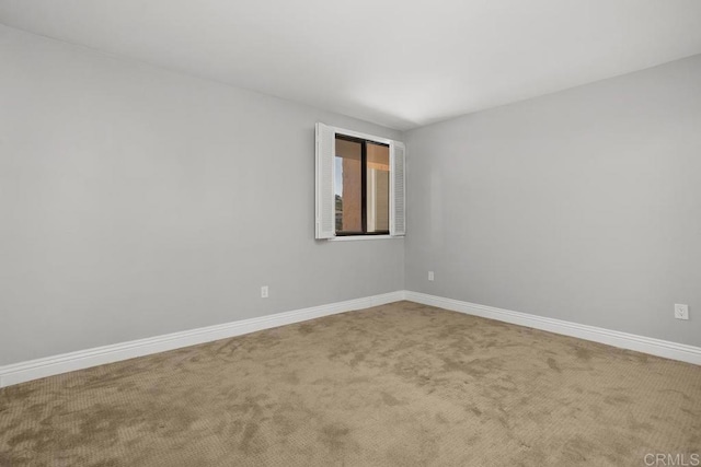 empty room with carpet flooring