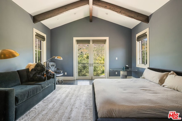 bedroom featuring hardwood / wood-style floors, vaulted ceiling with beams, and access to outside